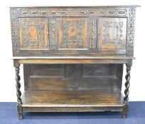 Carved oak court cupboard with rope twist legs and undershelf, W130 x D49 x H123cm