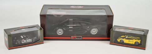 Three McLaren Collection 1:18 and 1:43 scale diecast model F1 GTR cars by UT models and Pauls
