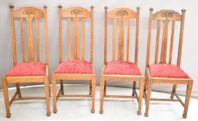 A set of four oak Arts & Crafts dining chairs, possibly Shapland and Petter