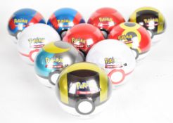 Pokémon TCG - Ten Pokéball collector tins, each containing three booster packs and two sticker
