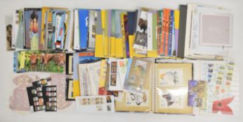Collection of GB first day covers and world stamps, loose and on and off paper. First day covers