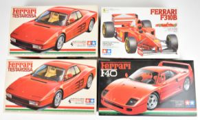 Four Tamiya 1:24 scale Ferrari plastic model kits comprising F40, F310B and Testarossa (x2), all