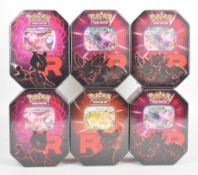 Pokémon TCG - Six Destined Rivals Team Rocket collector tins comprising Mewtwo, Nidoking and Persian