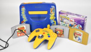 Nintendo 64 (N64) Pokémon Stadium Edition console and controller together with Puzzle League,