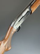 Remington Model 1100 12 bore 3-shot semi-automatic shotgun with ornately carved and chequered semi-