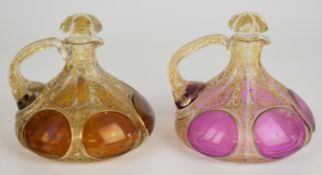 A pair of 19thC French cut glass decanters and stoppers with jewelled decoration and tinted