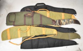 Eight various padded rifle or air rifle slips including Armex Force One, The Airgun Centre etc.