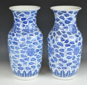Chinese pair of late 19th/20thC porcelain vases with blue and white foliate decoration and four