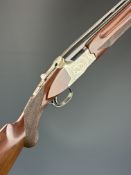 Winchester Super Grade XTR Lightweight 12 bore over and under ejector shotgun with engraved scenes