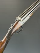Holland & Holland 12 bore side by side ejector shotgun with named and engraved locks, engraved