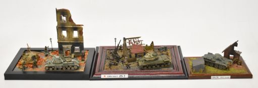 Three WW2 model dioramas comprising a 1/72 scale WW2 model diorama titled 'JS-2 Takeover', showing a