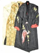 Two Chinese silk tunics with embroidered decoration, and a Japanese Haori with geometric gold and