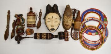 A collection of North African tribal items including beaded collars / necklaces from Masai tribe,