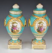 Pair of 19thC Berlin covered pedestal vases with flower and Watteau decorated cartouches and