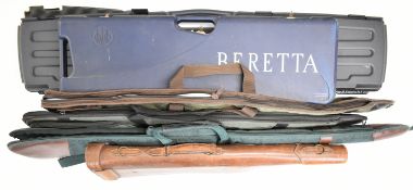Six shotgun and rifle carry cases and slips including a Beretta hard case to suit an over and