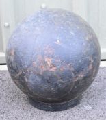 Cast iron fishing weight or similar with eyelets to attach ropes, approximately 30cm diameter with