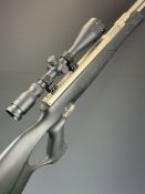 Weihrauch HW97K .22 underlever air rifle with composite stock, textured thumb-hole grip, raised