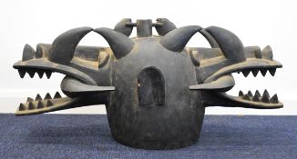 Large African tribal 'firespitter' mask, probably Senufo tribe, H40 x L85cm