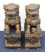 Pair of Chinese carved wood Dog of Fo figures with gilt decoration, H50cm
