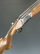 Miroku 6000 12 bore over and under ejector shotgun with engraved locks and underside, chequered