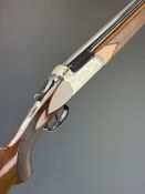 Angelo Zoli 20 bore over and under shotgun with engraved action, underside, trigger guard, top plate