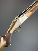 Browning 525 Grade 1 12 bore over and under ejector shotgun with engraved action and underside,