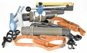 A collection of gun and shooting accessories including an American M1907 rifle sling stamped MRT,
