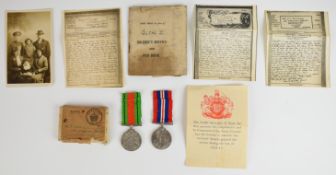 WW2 medals comprising War Medal 1939-45 and Defence Medal with certificate, photo and soldier's