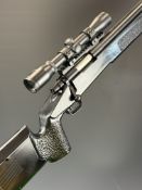 Remington style 6mm bolt-action airsoft rifle with composite stock, textured semi-pistol grip and