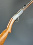 Browning .22 semi-automatic take-down rifle with semi-pistol grip, adjustable sights and 19 inch