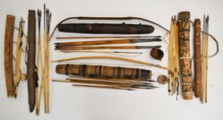 Six 19thC and later tribal quivers with arrows and three bows including African, fish arrows, tooled