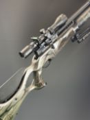 BSA R-12 CLX Pro .177 PCP air rifle with laminated show wood stock, chequered thumb-hole grip and