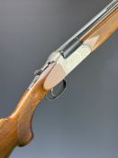 Unnamed 12 bore over and under ejector shotgun with engraved scenes of birds to the action and