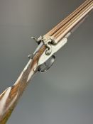 A Homer of Birmingham 12 bore side by side hammer action shotgun with engraved locks, hammers,