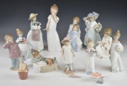 Fourteen Nao figures including a butterfly, all boxed, tallest 27cm