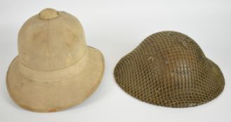 Two helmets comprising a British WW2 'Brody', with interior dated 1943 and netting, and a pith hat