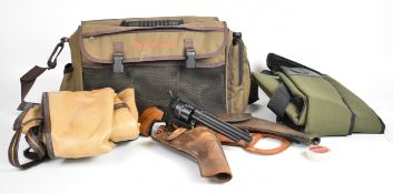 A collection of guns and gun accessories comprising a six-shot single action blank firing