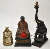 Three Chinese/Indian figures including figural elephant lamp, tallest 58cm