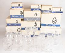A suite of approximately seventy eight Waterford Crystal Coleen pattern drinking glasses