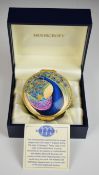 Moorcroft enamel hinged pill box with peacock decoration, diameter 5.5cm, boxed