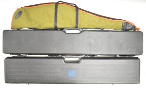 Three shotgun or rifle cases and slips comprising RWS and Hoppe's Protecto hard carry cases, and a