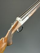 SKB Royal Light 12 bore side by side shotgun with named locks, chequered semi-pistol grip and