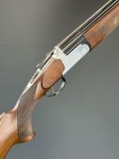 Fabarm Gamma 12 bore over and under ejector shotgun with engraved action, underside and thumb lever,