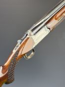 Nikko Shadow Indy 12 bore over and under ejector shotgun with engraved action, trigger guard,