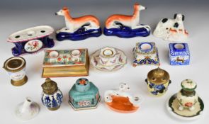 Collection of inkwells, pen stands including Staffordshire greyhounds, spaniel, standish in the form