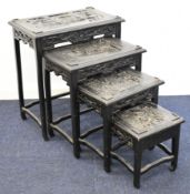 Chinese carved wood nest of four tables, largest W55 x D35 x H62cm