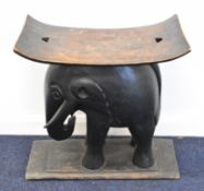 African tribal carved seat with figural elephant support, W57 x H57cm