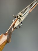 San Marco Magnum 12 bore side by side hammer action shotgun with engraved scenes of birds to the
