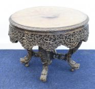 19thC Anglo Indian carved hardwood circular low table with shaped apron, raised on figural animal
