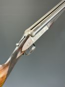 WW Greener 12 bore side by side ejector shotgun with side safety, engraved scenes of birds to the